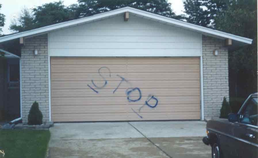StoP written on Tom Padgett's garage door